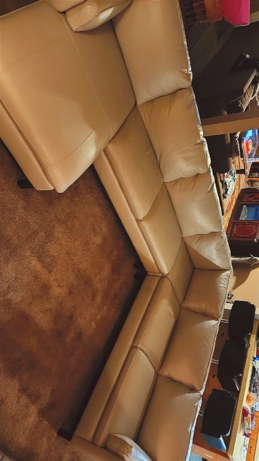 Off White Leather Sectional Firm Very Strong Very Well Made With Wood Feet.asking 800.