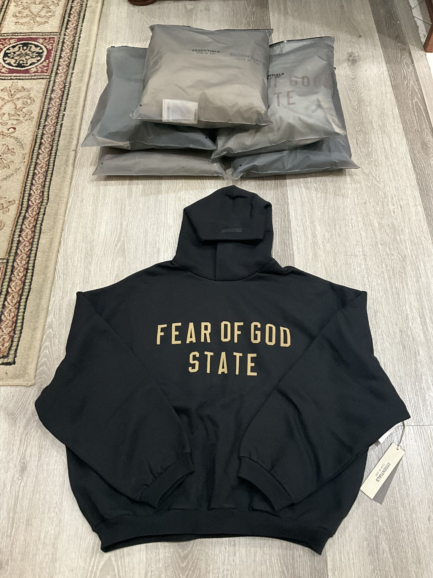 Fear of God Essentials Black Fleece Hoodie