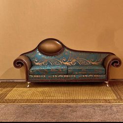 1940s-inspired teal cut velvet sofa