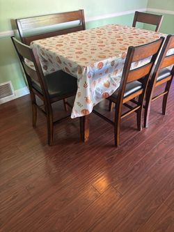 Wood dining table with bench