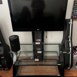T.v. Stand with glass shelves