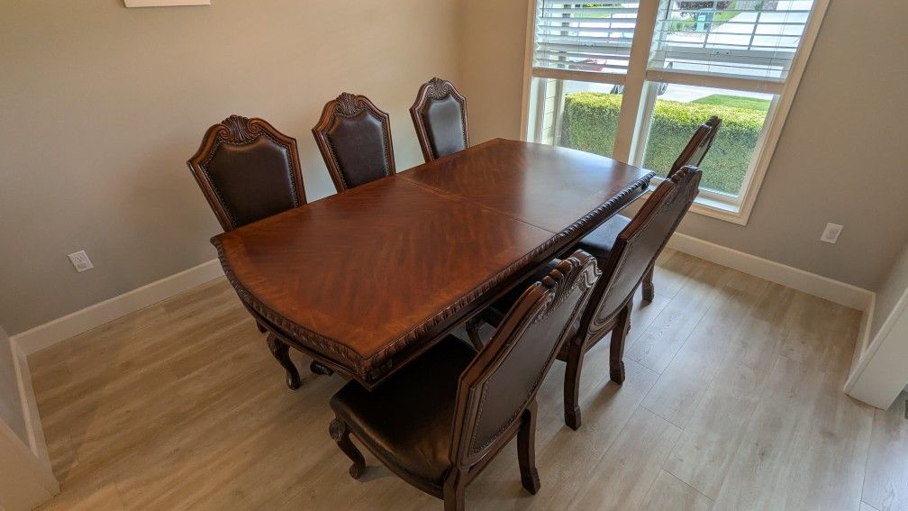 European style dining table with six chairs