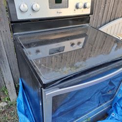 Whirlpool  Electric  Stove Used And Over The Stove Microwave 