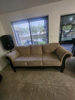 Beige Fabric Sofa with Elegant Wood Details – Great Condition