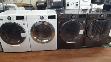 LG...black stainless electric 220 volt new open box ...also white gas washer and dryer..