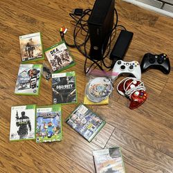 Xbox 360 console with games