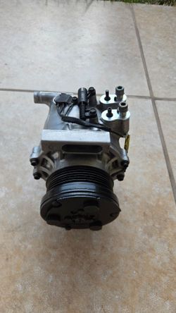 R129 AC compressor