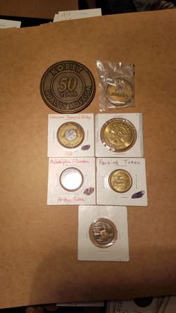 7 tok , 1 kopet 50 yea. qual & Design, 1 I qual Race to zero, 1. Water & train div, 1 park. token, 1 Phil Camden Br. 1 Delaw. mem Br.