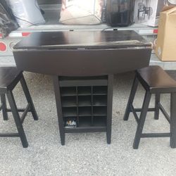 3 Piece Drop Leaf Pub Style Table With Wine Bottle Slots. Make Offer