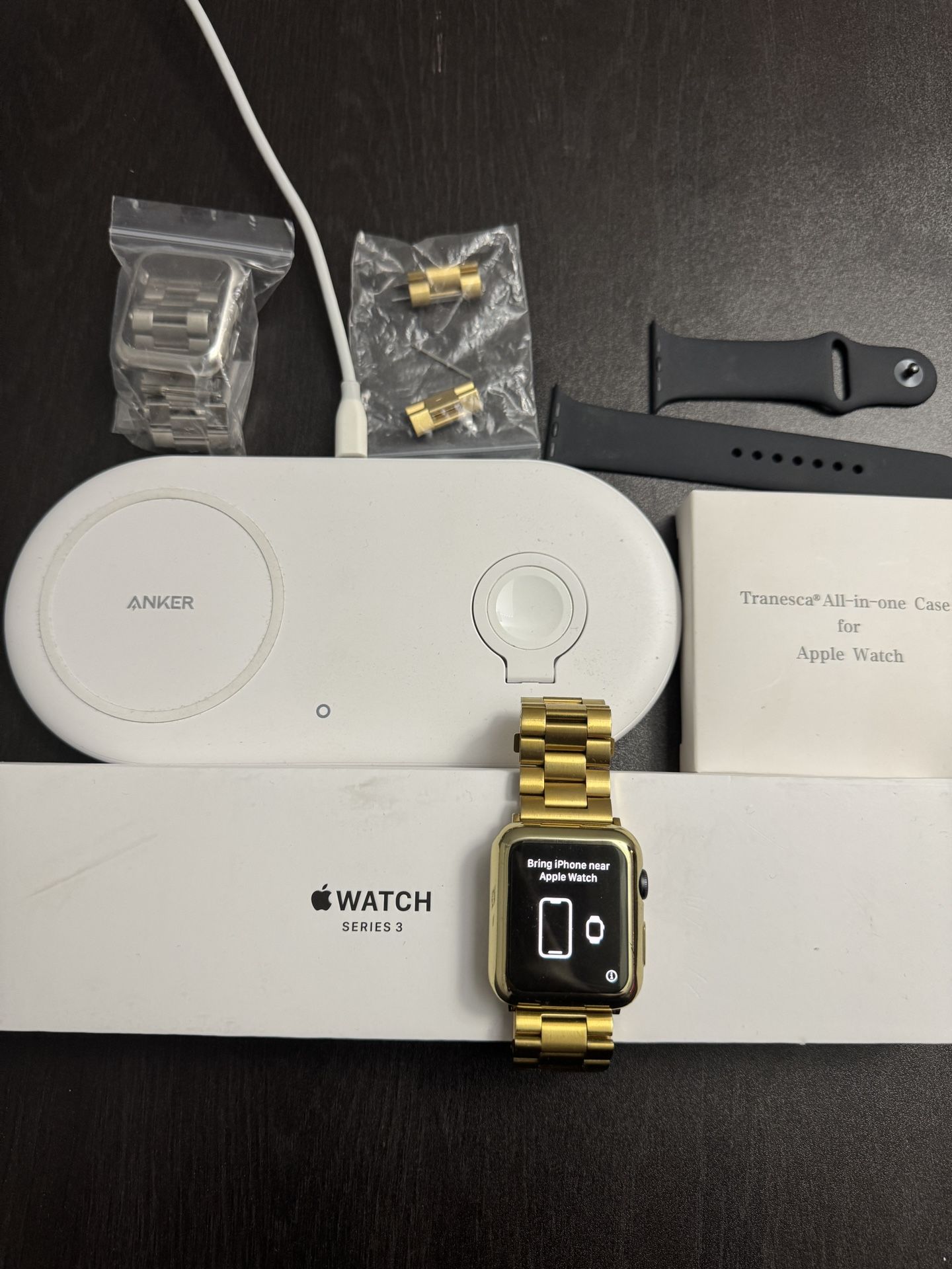 Apple Watch Series 3 w/ 3 Cases, Charging Pad, and Original Accessories