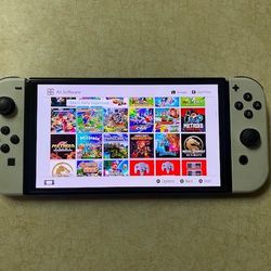 NINTENDO SWITCH OLED with 7500 GAMES INSTALLED