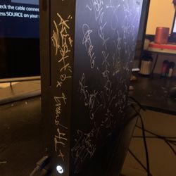 Xbox one X with 2 controllers and games