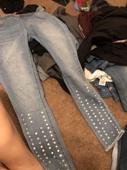 16 pcs of justice denim pants and shorts never used!sizes..12 up to 14!