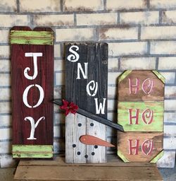 Handcrafted rustic wood Christmas signs