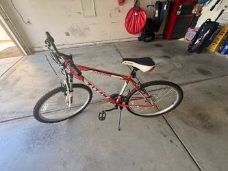 Titan Pathfinder Men’s 18-Speed All Terrain Mountain Bike with Front Shock Suspension