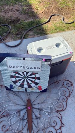 Dartboard and Ice chest