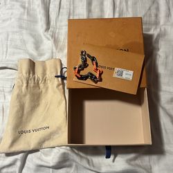 Orange and black Louis Vuitton chain link bracket L