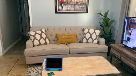 Beige fabric couch about 80” wide