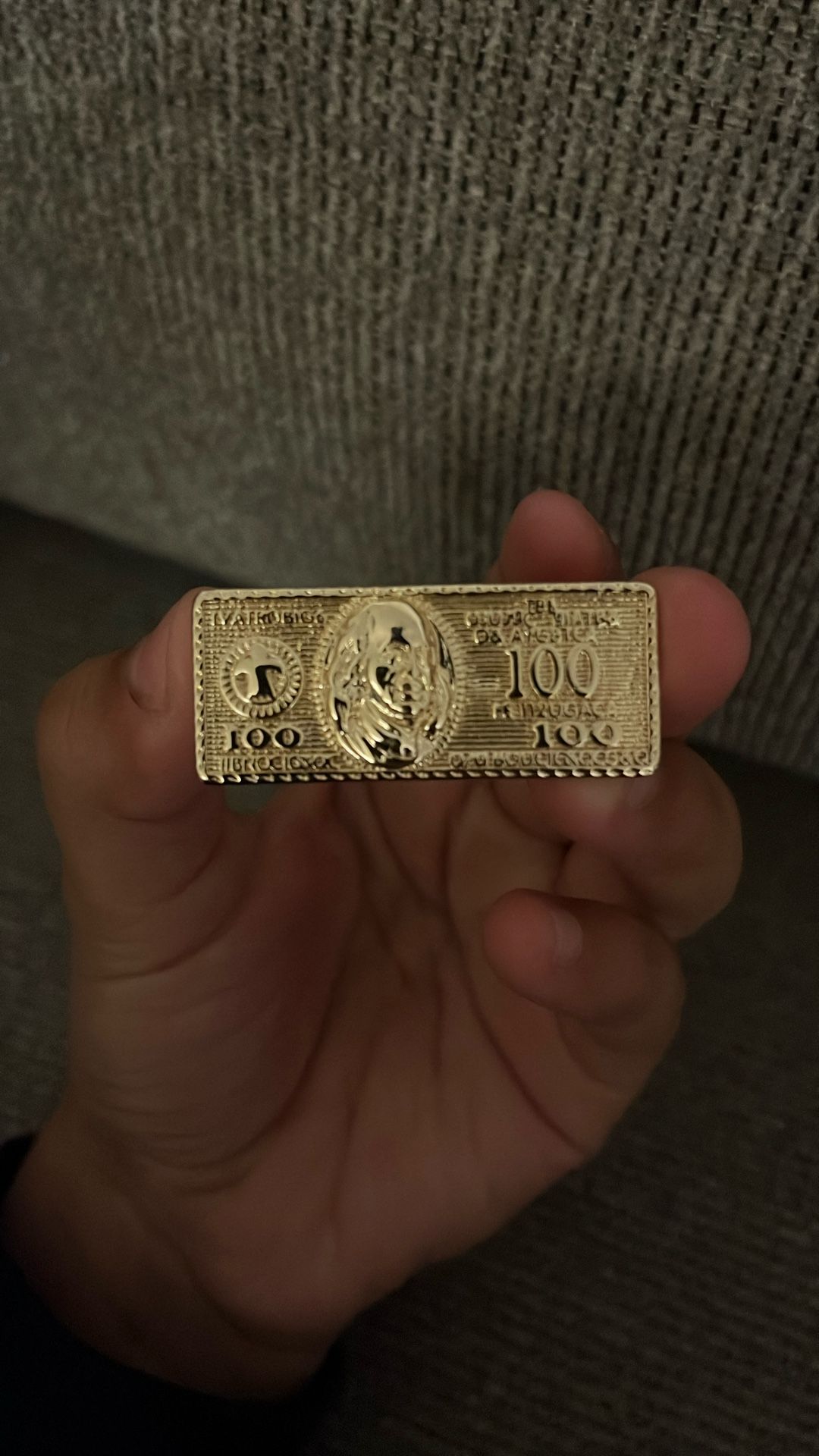 2 finger ring 100$ bill