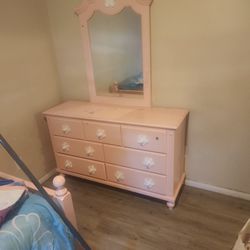 Trundle bed, mirror, dresser and nightstand