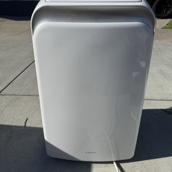 Portable AC unit for window or sliding glass door.