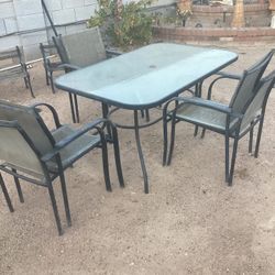 Glass Top Table And Six Chairs