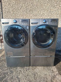 LG Front Load Washer and Dryer Set with Pedestals