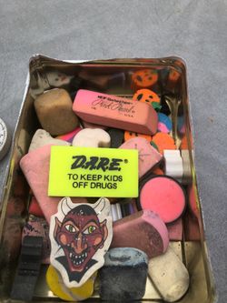 Old tin box of erasers