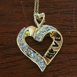 10k yellow gold diamond love heart necklace.