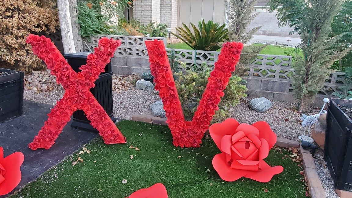 Paper Roses And XV Letters.