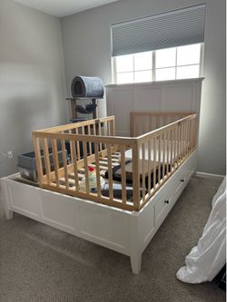 White bed and chest