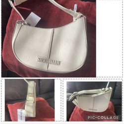 Half moon taupe Steve Madden  great for work or any ocassion.  New