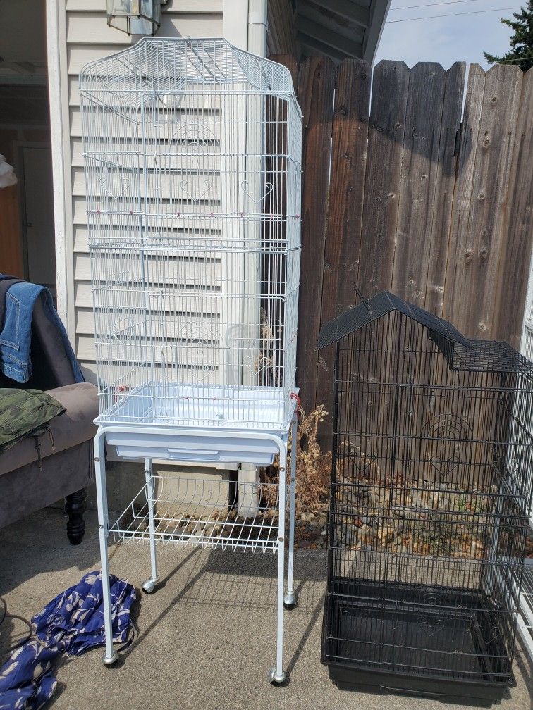 2 bird cages I black 1 white