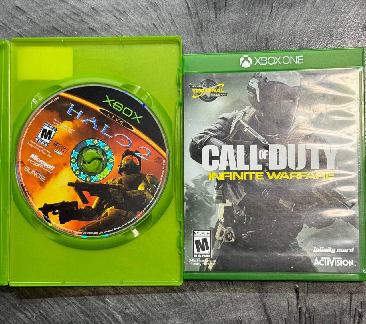 LOT OF 2 - Halo 2 for the original Xbox (disc only) and Call of Duty: Infinite Warfare for Xbox One (complete with case).