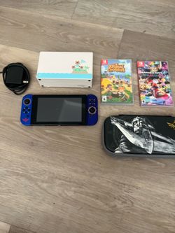 Nintendo switch with docking station 2 games and 256 GB SD card