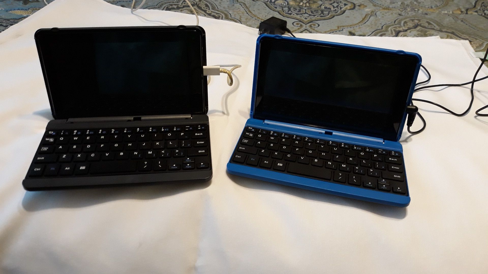 They are each a tablet with a keyboard for $20 each.
