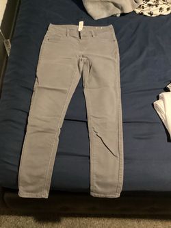 grey jeans