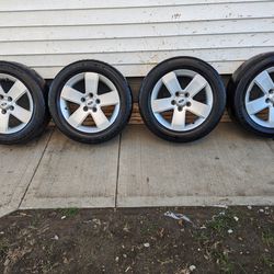 4 16 Inch Rims off a Ford Fusion Tires are bald