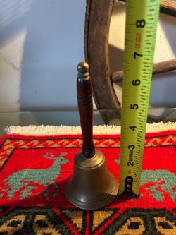 Campana bronce madera