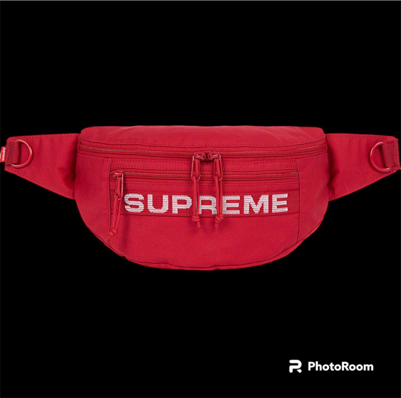 wearing supreme waist bag