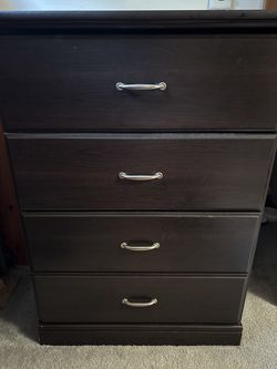 Four drawer easy glide dresser only a few scratches on top, lots of storage!