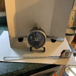 Metal Airplane clock working display piece. Approximately 14” wide, 7.5” tall, 9” deep Incredible details, great conversation piece Plainfield, Illino
