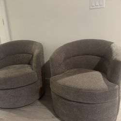 Two Gray Swivel Chairs 