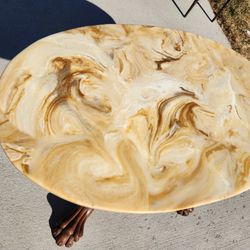 marble - like table
wood base
claw feet style
top: 40x25"
height: 25"
$50

P.S: top material- marble or resin , not sure
You can glue on the base