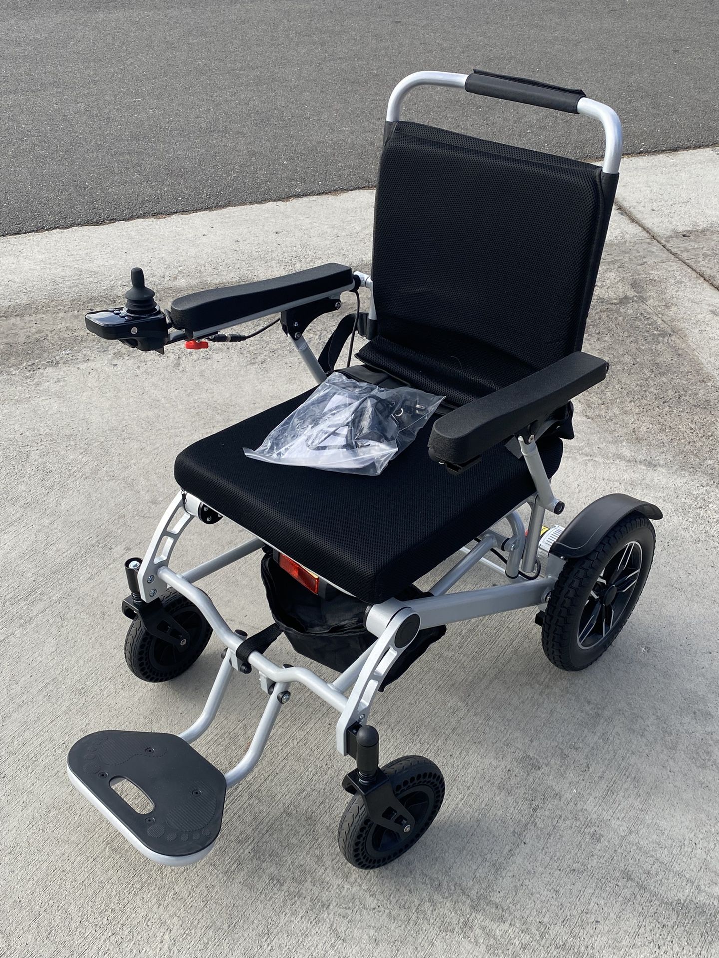 Brand New - Folding Electric Wheel Chair Worth $990