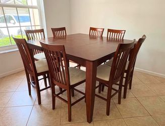 Wooden dining table and chairs