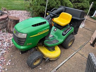 John Deere L108 18.5HP 42” deck with 2 bin bagger riding lawn mower