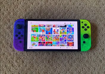 NINTENDO SWITCH OLED with 100 SWITCH GAMES and 7500 CLASSIC GAMES