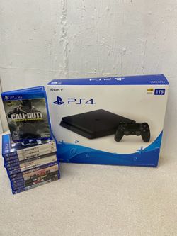 PS4 Slim 1 TB W/ Box, Controller, and Games