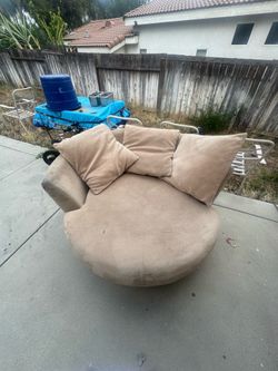 Brown round couch